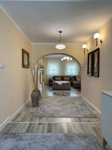 a living room with a couch and a table at Plav Serviced Apartments by Doni in Plav