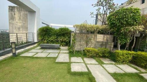 Κήπος έξω από το Xanadu Studio Apartment# 902, KOLKATA