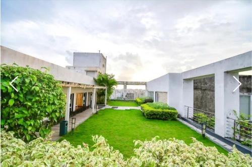Κήπος έξω από το Xanadu Studio Apartment# 902, KOLKATA