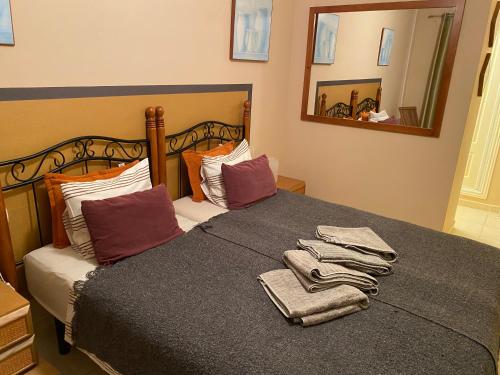 A bed or beds in a room at Apartamento Mi casa tu casa