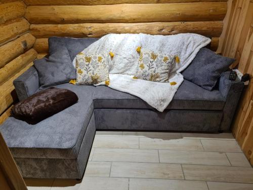 Posezení v ubytování Le chalet du Colibri