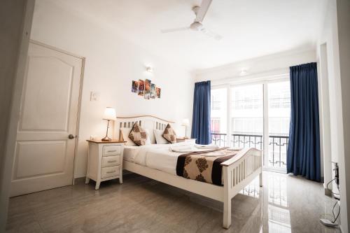 Katil atau katil-katil dalam bilik di Bellagio Rezidencia 1 BHK Service Apartments