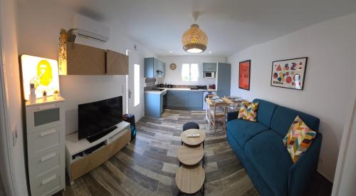 T2 rez de jardin de villa au calme