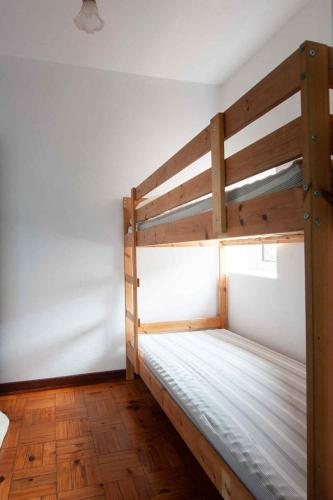 Ένα ή περισσότερα κρεβάτια σε δωμάτιο στο Casa reizinho