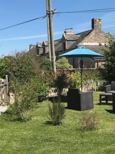 Un jardín fuera de Gîte l'Hermine