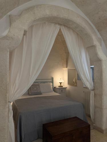 Postel nebo postele na pokoji v ubytování Masseria Don Sante