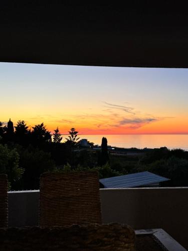 a view of a sunset from the roof of a house at Dimora da Adele in Termoli