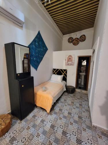 Katil atau katil-katil dalam bilik di RIAD Belkayed Fez