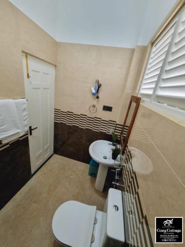 Ένα μπάνιο στο Cozy cottage