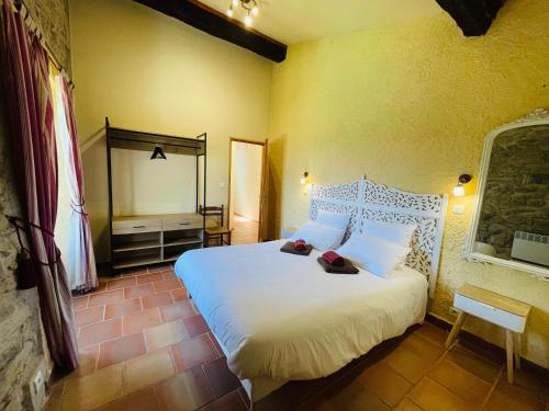 Ένα ή περισσότερα κρεβάτια σε δωμάτιο στο Mas D'en Portes