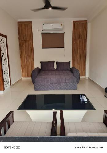 Postel nebo postele na pokoji v ubytování Rishikesh Heritage Resorts