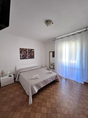 En eller flere senge i et værelse på Rosanna House