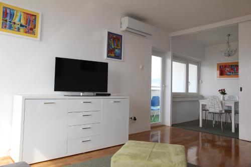 TV a/nebo společenská místnost v ubytování Panorama