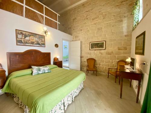 Ένα ή περισσότερα κρεβάτια σε δωμάτιο στο Agriturismo Villa Flavia