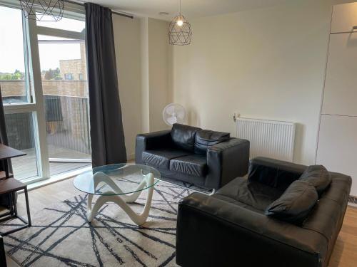 Χώρος καθιστικού στο Spacious Erith Apartment