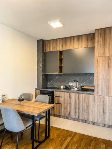 Kuchyň nebo kuchyňský kout v ubytování Soho Apartments