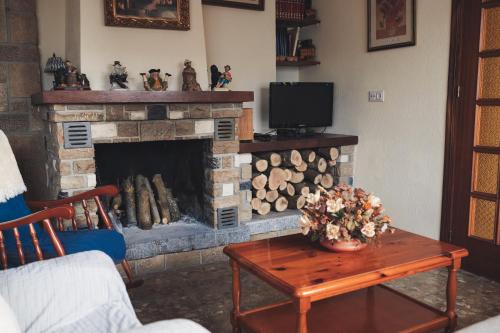 TV a/nebo společenská místnost v ubytování Cumbre Serena