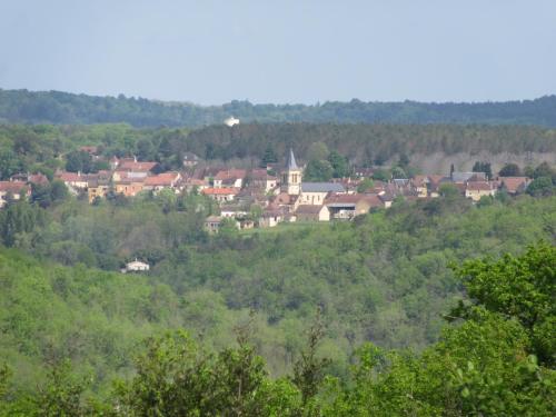 a small town in the middle of a green hill at La Bertrandie in Florimont-Gaumiers