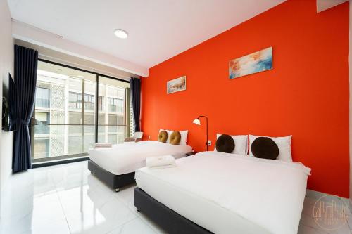 Katil atau katil-katil dalam bilik di KN Holiday Home in Global City