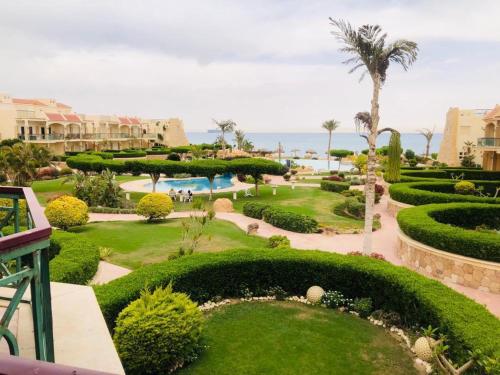 a view of a resort with a pool and landscaping at العين السخنة in Ain Sokhna