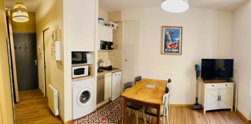 Photo de la galerie de l'établissement Centre-ville Ax-les-Thermes proche des télécabines, à Ax-les-Thermes