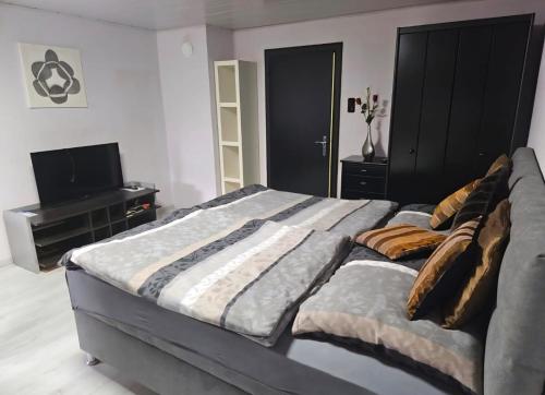 Cama o camas de una habitación en Ferienhaus Petzenblick