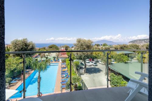 a view of the pool from the balcony of a resort at Hotel Gardenia Sorrento, Ascend Hotel Collection in Sorrento