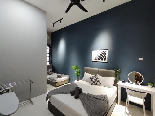 Χώρος καθιστικού στο Ipoh Guesthouse by IWH Suites