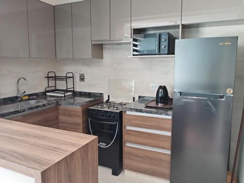 Kuchyň nebo kuchyňský kout v ubytování Cochabamba-Bolivia elegante