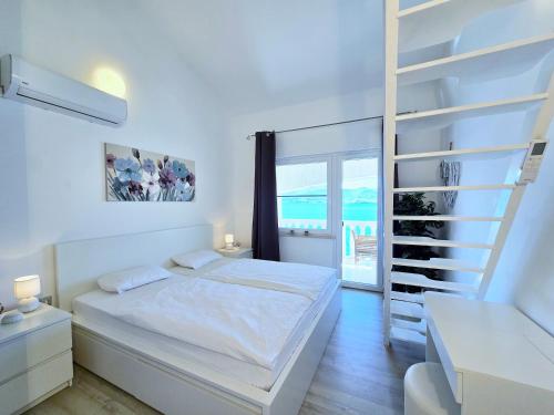 Posteľ alebo postele v izbe v ubytovaní Apartment Villa Bralo
