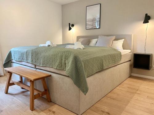 Giường trong phòng chung tại Ferienwohnung Bergliebe mit Sauna und Terrasse