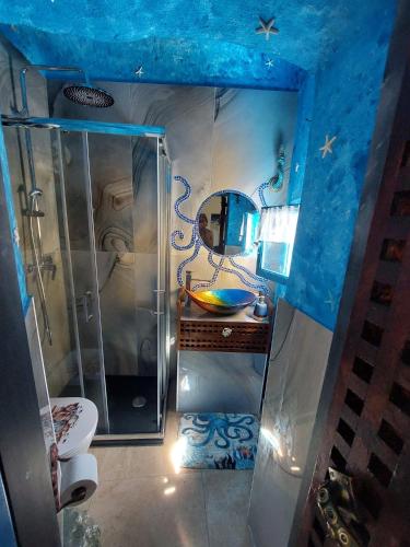 a bathroom with a shower and a sink and a toilet at I cavallucci marini in Lerici