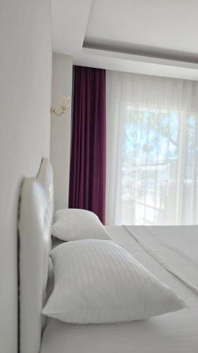 Cama o camas de una habitación en Serin Otel