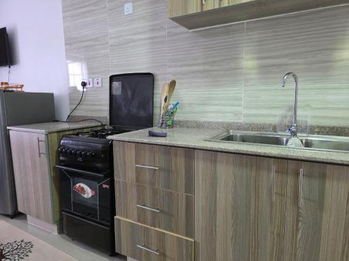 Η κουζίνα ή μικρή κουζίνα στο Stadeview Suites 5013