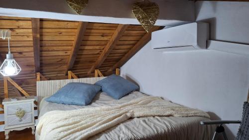 Ένα ή περισσότερα κρεβάτια σε δωμάτιο στο A Casinha