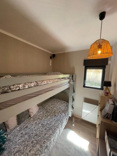 Postel nebo postele na pokoji v ubytování Le Cocon Appartement 4à 6 couchages 75 M2 avec terasse