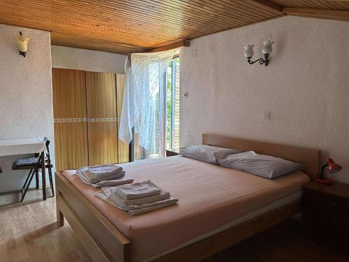 Postel nebo postele na pokoji v ubytování Apartment Marija 2