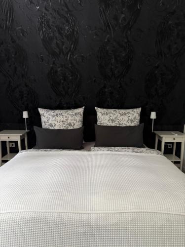 Ένα ή περισσότερα κρεβάτια σε δωμάτιο στο Luxury Apartment Amina