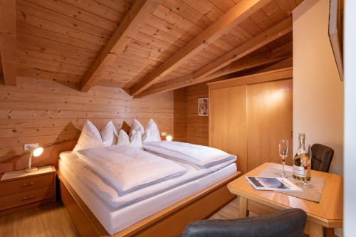 Postel nebo postele na pokoji v ubytování Apart Alpensonne