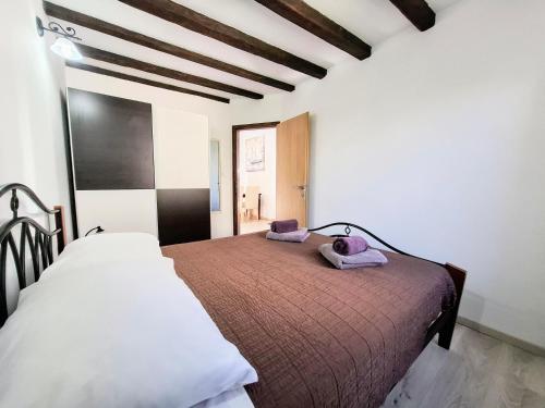 Posteľ alebo postele v izbe v ubytovaní Holiday Home Don