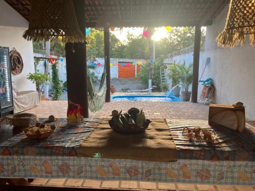 a table with a bunch of bananas on top of it at CASA DA PIPA in Pipa
