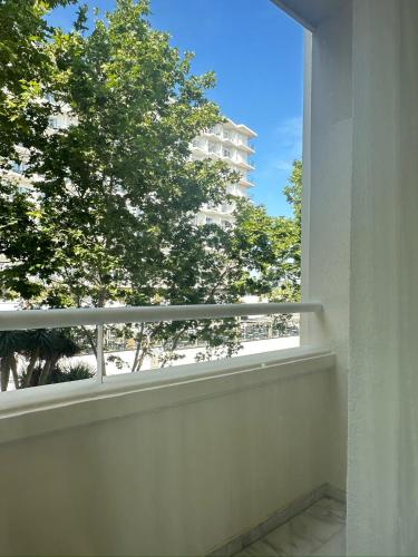 a window with a view of a building at Luxury apartments Alamos beach Torremolinos - Costa Lago in Torremolinos