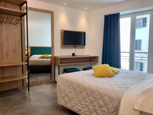 Hotel Locanda Alla Perlaにあるベッド