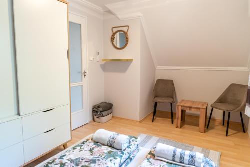 a living room with a couch and a table at Zöld vendégház in Békésszentandrás