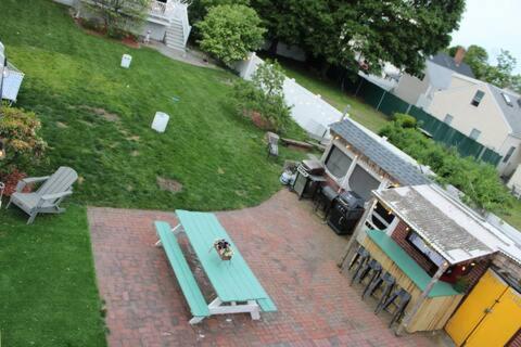 an aerial view of a picnic table and a trailer at NEW! Family-Friendly Getaway -1 Mi to Dtwn Salem w Roof Deck & Tiki Bar in Salem