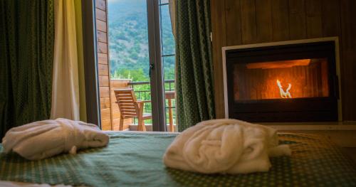 A bed or beds in a room at Irene's Resort