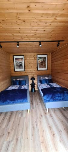 Postel nebo postele na pokoji v ubytování Domek Baltic
