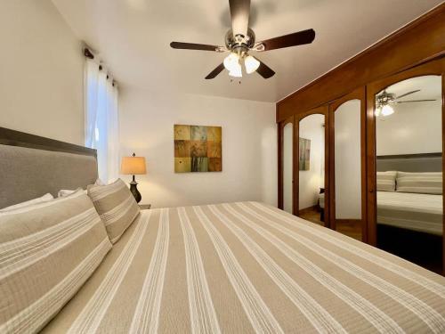 Ένα ή περισσότερα κρεβάτια σε δωμάτιο στο Puerto Nuevo Surf Casita de Mimbre 1BR with pool