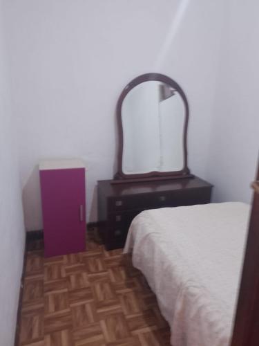 Postel nebo postele na pokoji v ubytování Melide Rooms