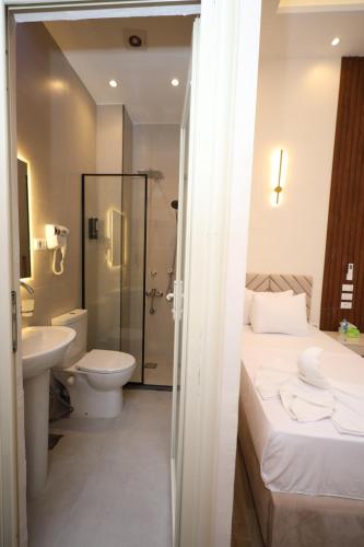 Koupelna v ubytování Aphrodite Boutique Hotel